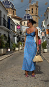 Beautiful girl in Blue Floral Midi Dress with Straps on the street 