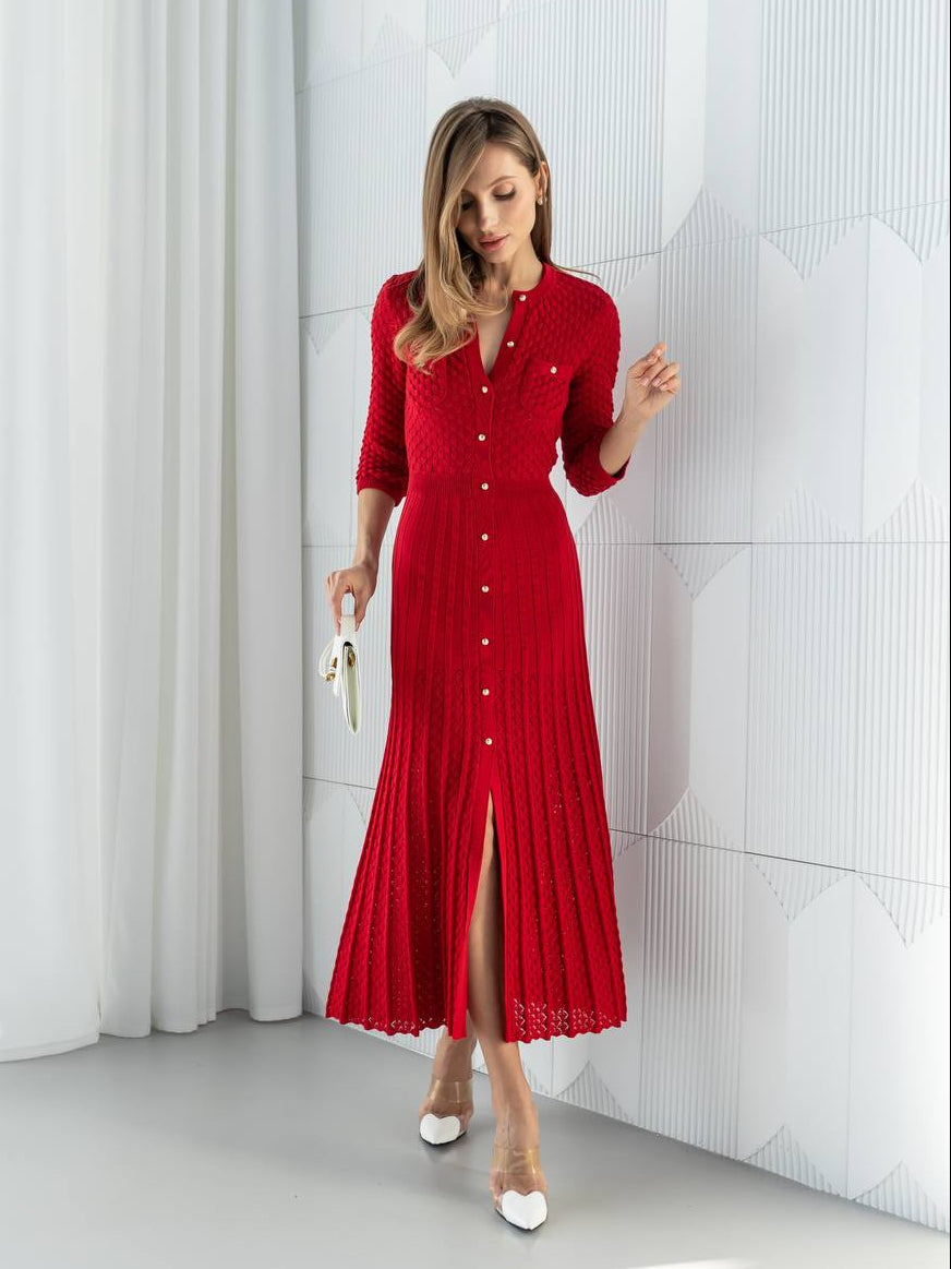 Woman wearing a red dress with a white background