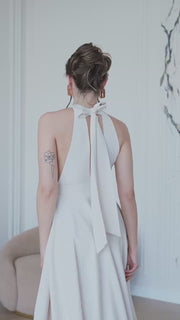 Halter Neck Dress with Open Back and Flowy Skirt