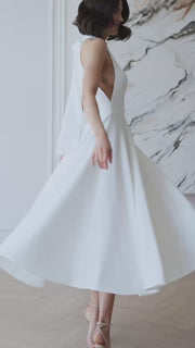 Halter Neck Dress with Open Back and Flowy Skirt